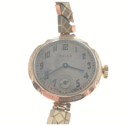 398 - A 375 stamped yellow gold ROLCO circular faced watch with yellow metal stretch strap, gross weight 1... 