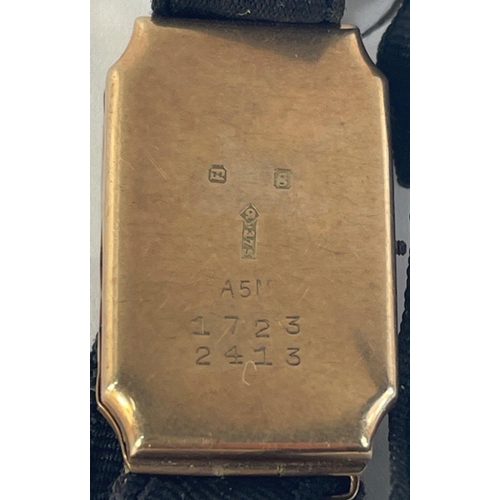 399 - A 375 hallmarked rectangular gilded faced Swiss made 15 jewel movement watch with fabric strap gross... 