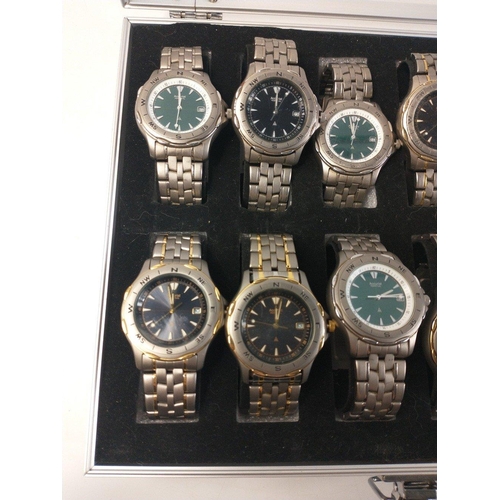 414 - An aluminium style display case with twelve ACCURIST branded perpetuals watches, some used#49