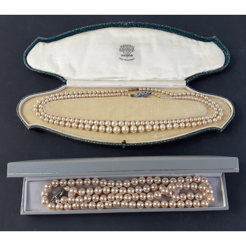 440 - Two strings of LOTUS pearls and a string of faux pearls#77