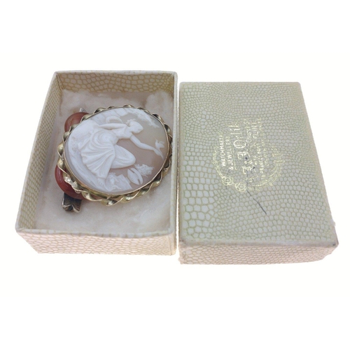 449 - VINTAGE - A small box with 2 brooches one is a yellow metal cameo (4.75x4cm) the other is a white me... 