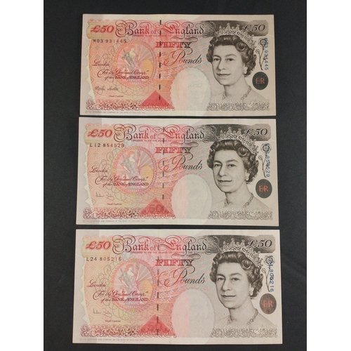 45 - Three Bank of England fifty pound notes signed by LOWTHER (M03 931445) and BAILEY (L12 854529, L24 8... 