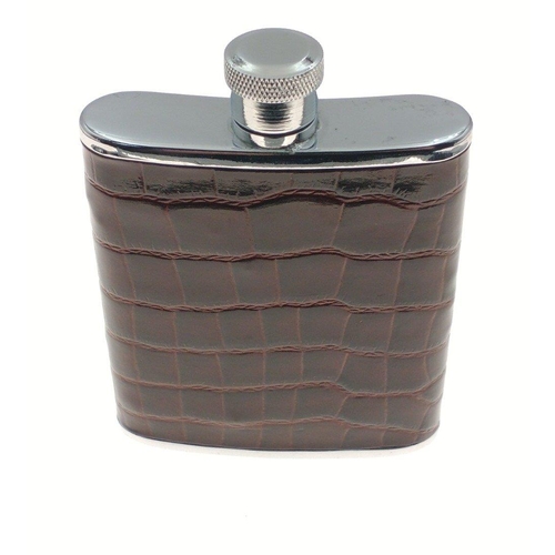 453 - A small pocket flask with leather covering 6.5cm x 7.5cm#90