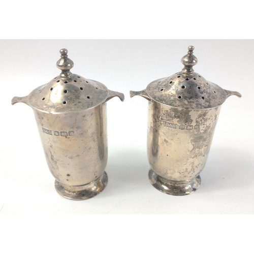 475 - A collection of hallmarked silver cruets to include 2 pepper pots Chester 1913, 2 lidded pots with h... 