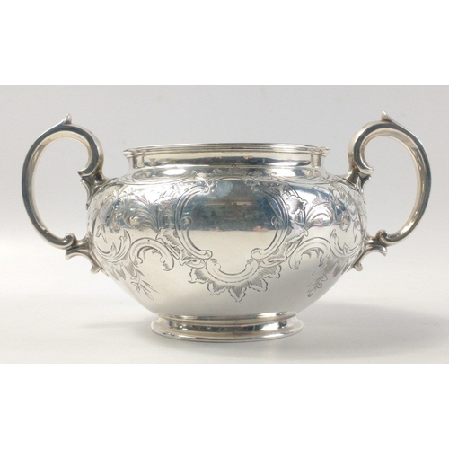 476 - A stunning Victorian solid silver teapot, cream jug and sugar bowl.  Superb bright cut design and al... 