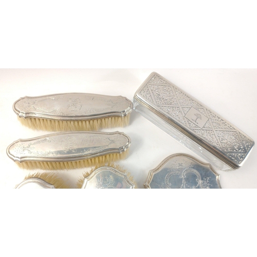 480 - A silver monogrammed dressing table set comprising a hand mirror, 2 hair brushes and 2 clothes brush... 