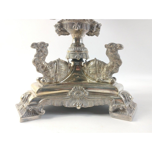 494 - An impressive silver plate 7 branch candelabra standing on 3 camels, height approx 51cm#132