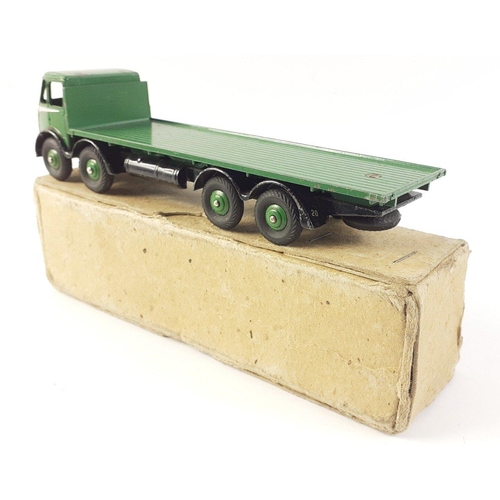 532 - DINKY SUPERTOYS No. 502 Foden Flat Truck. All green cab version. Green original paint and supplied i... 