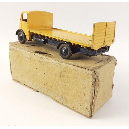 534 - DINKY SUPERTOYS No. 512 Guy Flat Truck. All Yellow cab version with blue Chassis. Original paint and... 