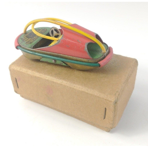 537 - Unusual MATOMIC 1950s push along small tin plate model of a futuristic car.  Approx 8cm long and ver... 