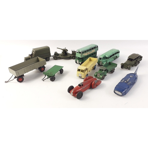 555 - A small but interesting collection of DINKY diecast models to include buses, six wheel truck with to... 