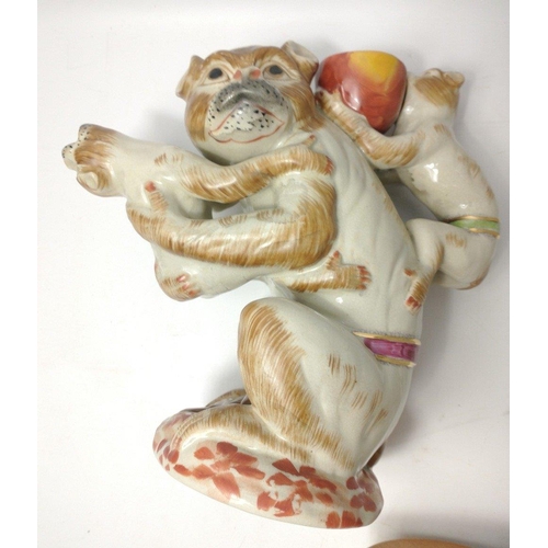 653 - A mixed box of ceramics and pottery to include a Meissen style monkey teapot without lid (23cm tall)... 