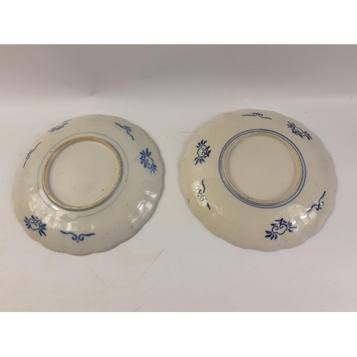 677 - A pair of Imari style Oriental plates each 21cm across and in good order.#318