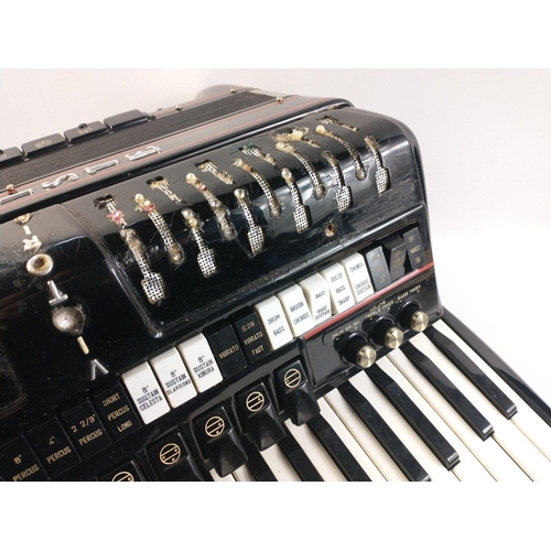 706 - Black coloured electronic accordion Victoria 