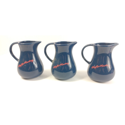 738 - Three blue coloured Whyte and Mackay water jugs#382