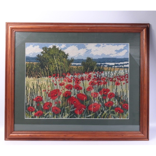 789 - Two completed and framed tapestries, one of a field of poppies, frame size 66x55cm approx, the other... 