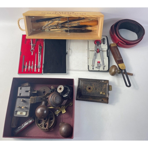 881 - A vintage door lock, 2 vintage electrical extension sockets (not tested), a penknife, a leather enca... 