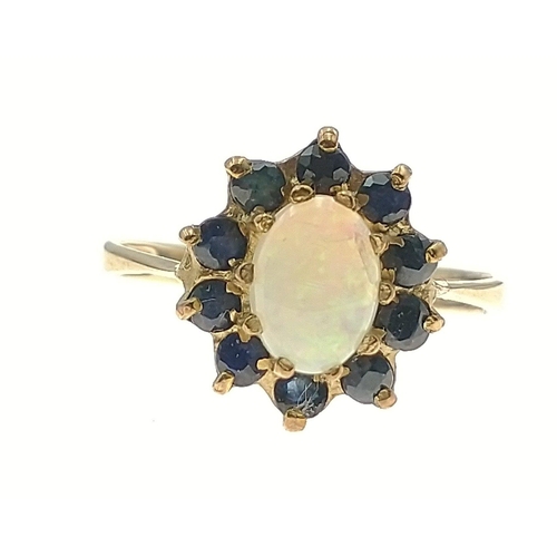 1 - OPULENT OPAL! A 375 hallmarked yellow gold opal and blue stone ring, size M, gross weight 1.75g#1... 