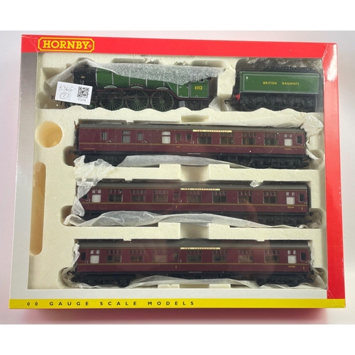 130 - Unopened from HORNBY - The Master Cutler Train Pack (R2195M) with the St Simon engine and The Caledo... 