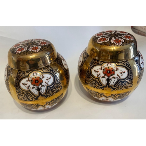 181 - A pair of HIGHLY DECORATIVE lidded ginger jars by Burtondale of Derbyshire 12 cm tall approx#184
