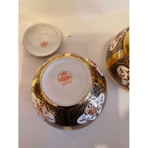 181 - A pair of HIGHLY DECORATIVE lidded ginger jars by Burtondale of Derbyshire 12 cm tall approx#184