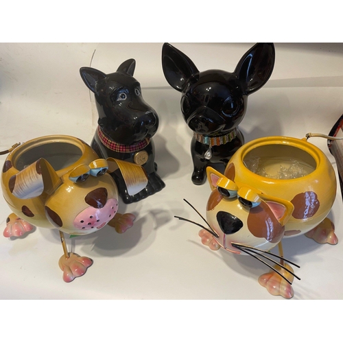 191 - A ceramic animal collection to include a SCOTTIE DOG cookie barrel with removable head and two comic... 