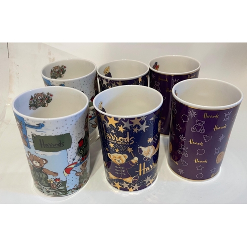 217 - SIX HARRODS XMAS themed Fine Bone China mugs all in good condition!#221