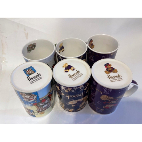 217 - SIX HARRODS XMAS themed Fine Bone China mugs all in good condition!#221