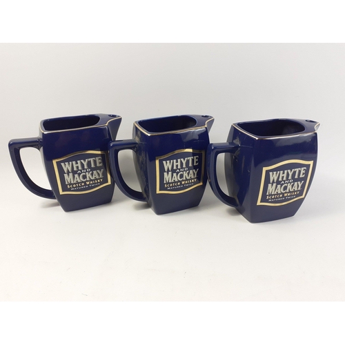 219 - Three WHYTE & MACKAY square shaped water jugs#223