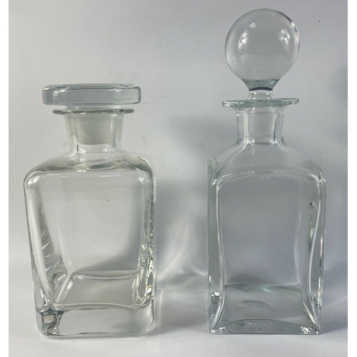 227 - Two square shaped glass decanters one 27cm tall (tiny chip from one corner of base) the other 21cm h... 