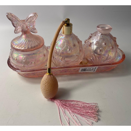 233 - A PRETTY iridescent glass boudoir dressing table set with matching tray to include a nice atomiser f... 