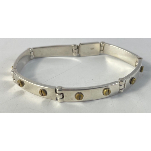 24 - A gent's bracelet with small brass screws, stamped 925, 19cm long, gross weight 29.7g approx#24