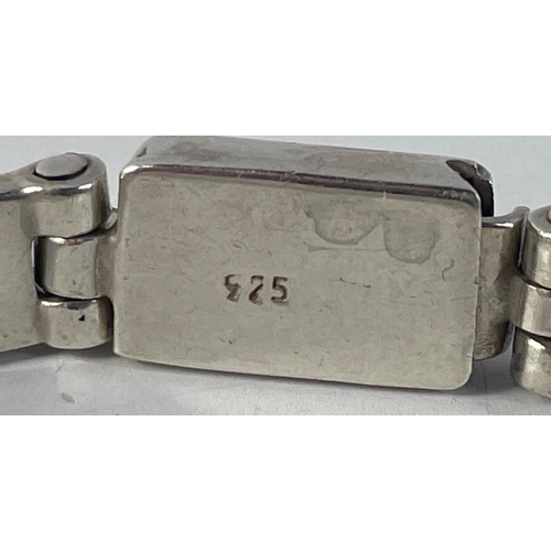 24 - A gent's bracelet with small brass screws, stamped 925, 19cm long, gross weight 29.7g approx#24