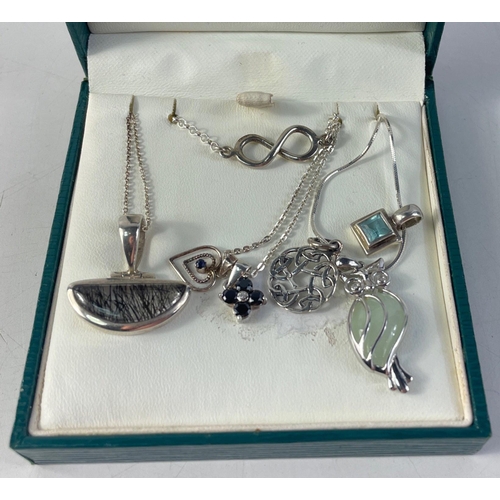 28 - A selection of silver necklaces - 3 chains in various styles and 6 varying pendants plus a bracelet,... 