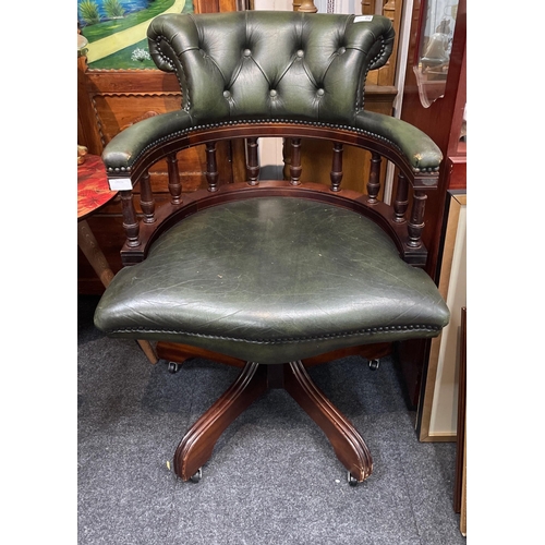 359 - A green leather swivel captain's chair with button back, showing some signs of wear to the arms#371... 