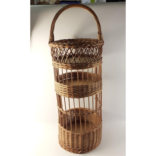 394 - Handy for drinks in the garden - this three level wicker basket allows safe carriage from kitchen to... 