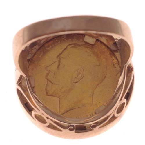 4 - A WHOPPER! of a full gold sovereign 1911 22ct coin set in 375 stamped gold ring - overall weight 14.... 