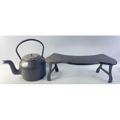 400 - A SWAINS no. 3 6 pint cast iron kettle and a cast iron fire shelf foot stool measuring 46x12x15cm#41... 