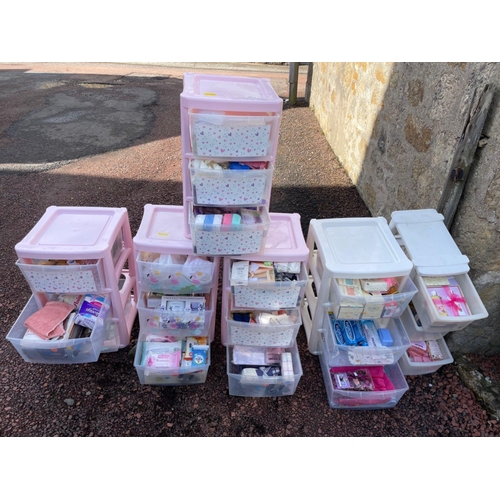 506 - A HUGE amount of toiletries and perfume sets and smellies etc all within pink stackable containers -... 