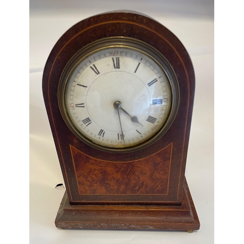 59 - An EDWARDIAN wooden cased with string inlay mantle clock, the clock face has Roman Numerals and come... 