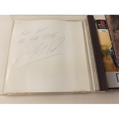 76 - Signed by COLIN McRAE - a Colin McRae Rally PlayStation game (SLES 00477) and a DVD of his authorise... 