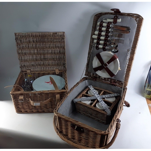 91 - Two lovely wicker picnic baskets with fittings and contents.  Stylish and useable.#93