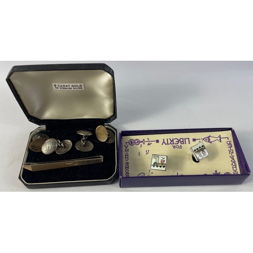 112 - A pair of silver cufflinks with indistinct hallmark (9.35 g approx) plus a tie pin - 9ct gold on sil... 