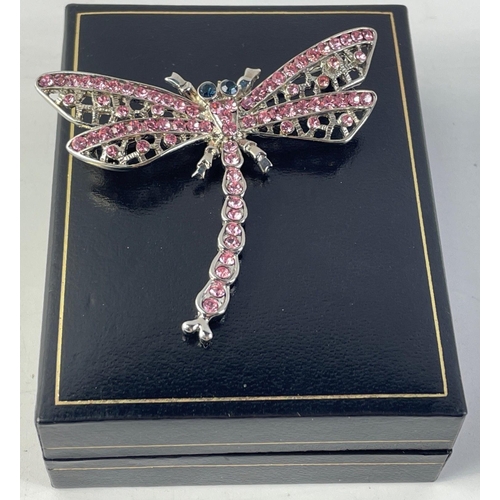 128 - (VNS)A PRETTY bling Dragonfly brooch in white metal with pink stones - dimensions 6cm length x 5cm w... 