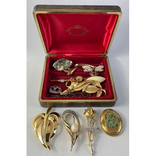 148 - Super lot of wonderful good quality costume jewellery in an older box. By Napier, Bouher, Sarah Cove... 