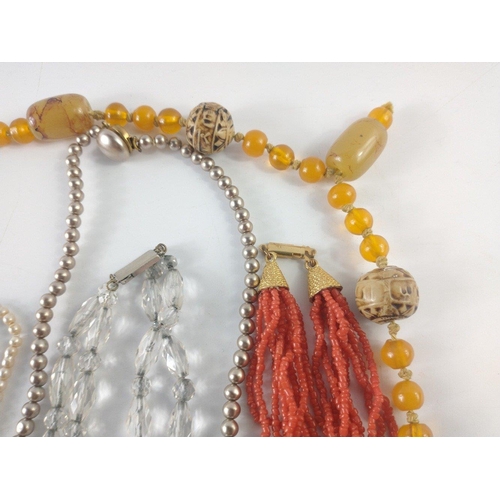 159 - A quantity of nice quality costume jewellery to include a coral inspired necklace and other necklace... 