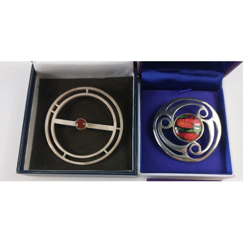 161 - A pair of very attractive modern art brooches in boxes.  A Heathergems of Pitlochry stone brooch and... 