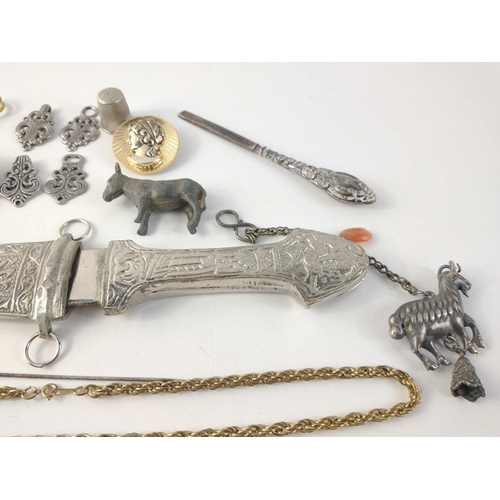 164 - An interesting bijouterie lot to include a middle eastern Jambiya style steel dagger in sheath and t... 