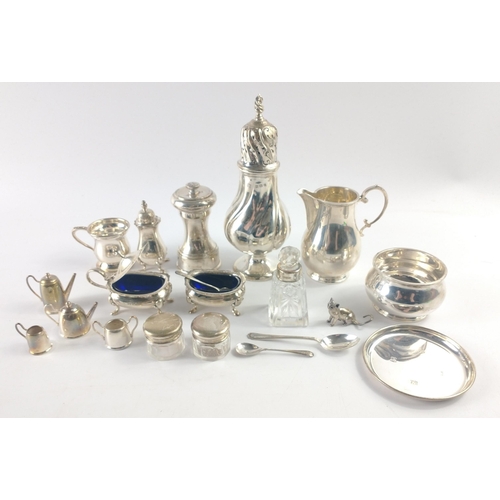 210 - An interesting collection of hallmarked silver to include a creamer and sugar bowl Birmingham 1965, ... 