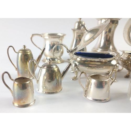 210 - An interesting collection of hallmarked silver to include a creamer and sugar bowl Birmingham 1965, ... 